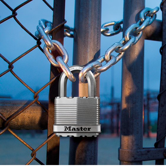 Master Lock magnum padlock on chained fence.