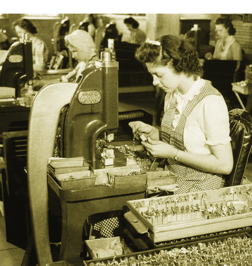 Master Lock worker assembling padlocks in factory during World War II.